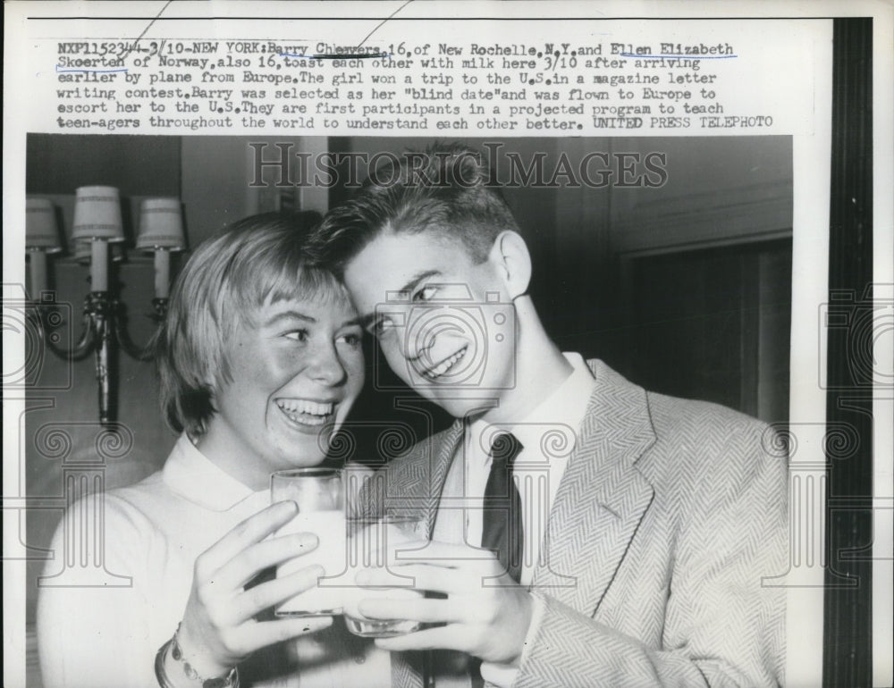 1958 Press Photo Barry Chevers and Ellen Elizabeth Skoerteh toast with a milk - Historic Images