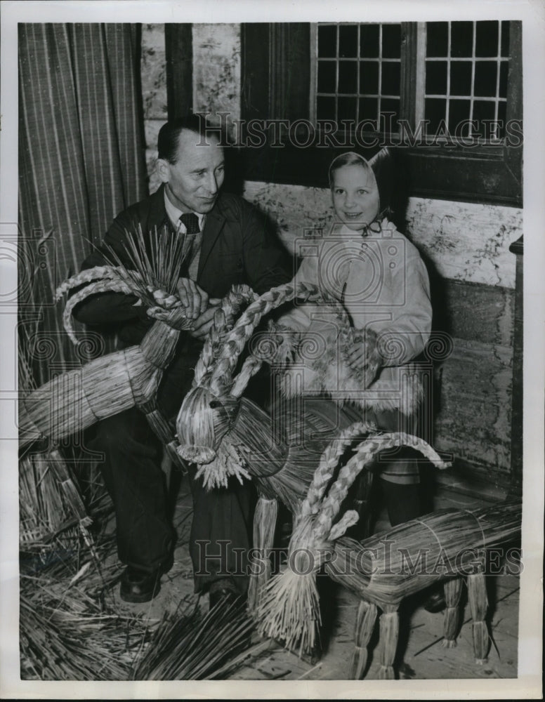 1954 Press Photo Stockholm Sweden Edvin Arvidsson &amp; Gunilla Ahl &amp; straw goats - Historic Images