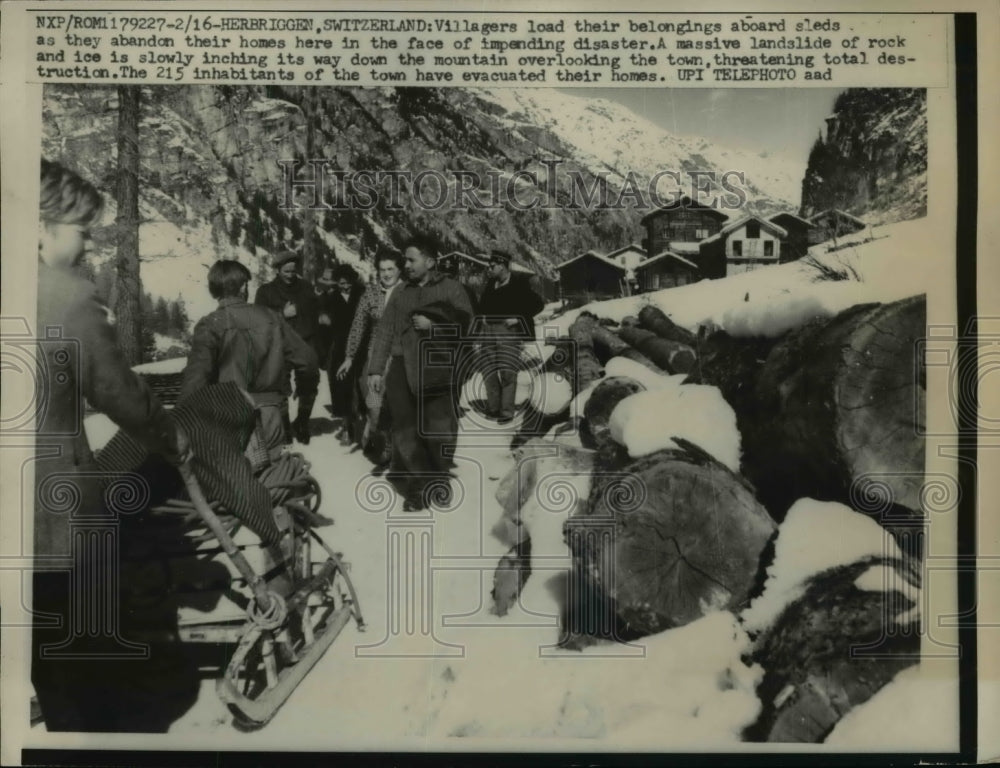 1959 Press Photo Villagers as they abandon their homes in Herbriggen,Switzerland - Historic Images