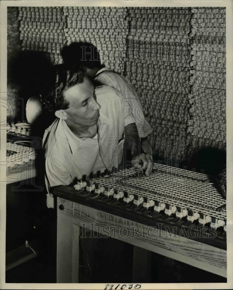 1948 Francisco Santiago as he weaves a floor mat in Rio Piedras-Historic Images