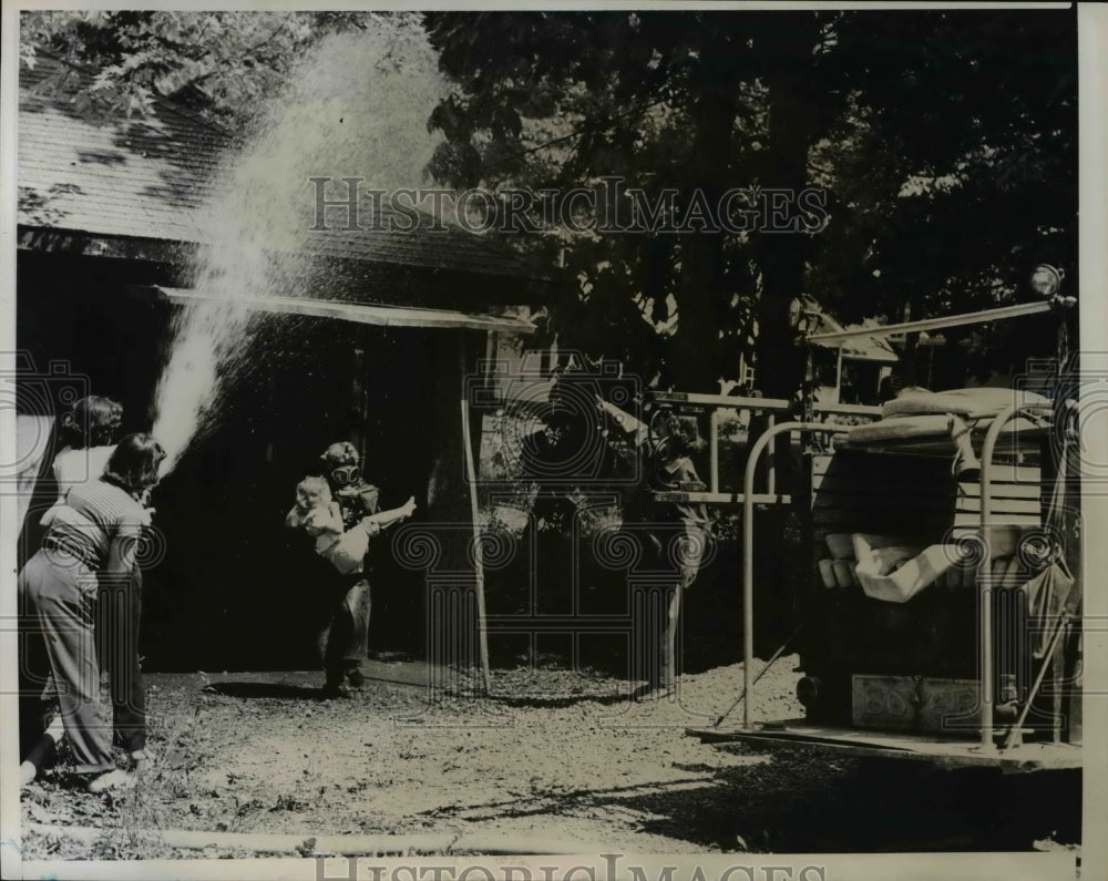 1951 Firewomen training on a simulated fire in the fire station-Historic Images