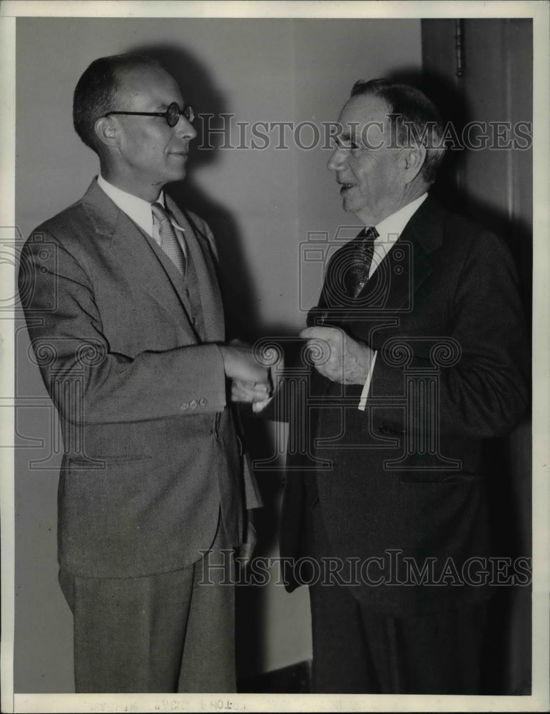 1934 Press Photo Claudius Murchison receiving congratulations from Secretary of - Historic Images