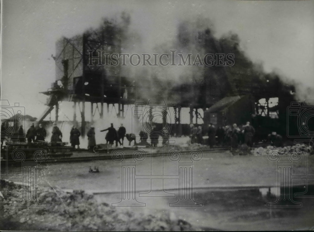 1939 Press Photo Flood of Treacle causes tremendous damage at Zeebrugge - Historic Images