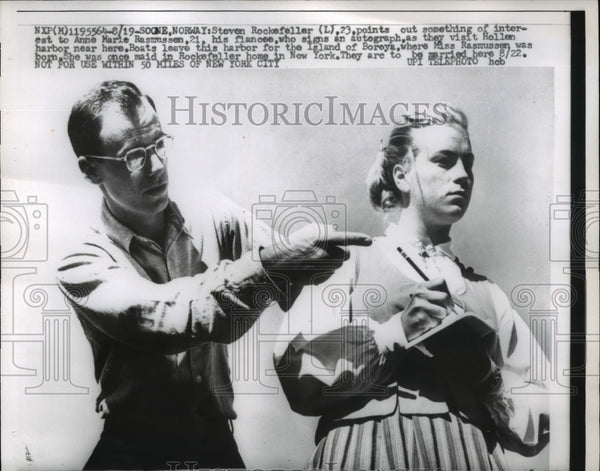 1959 Press Photo Steven Rockefeller, 23, points out something of inter ...