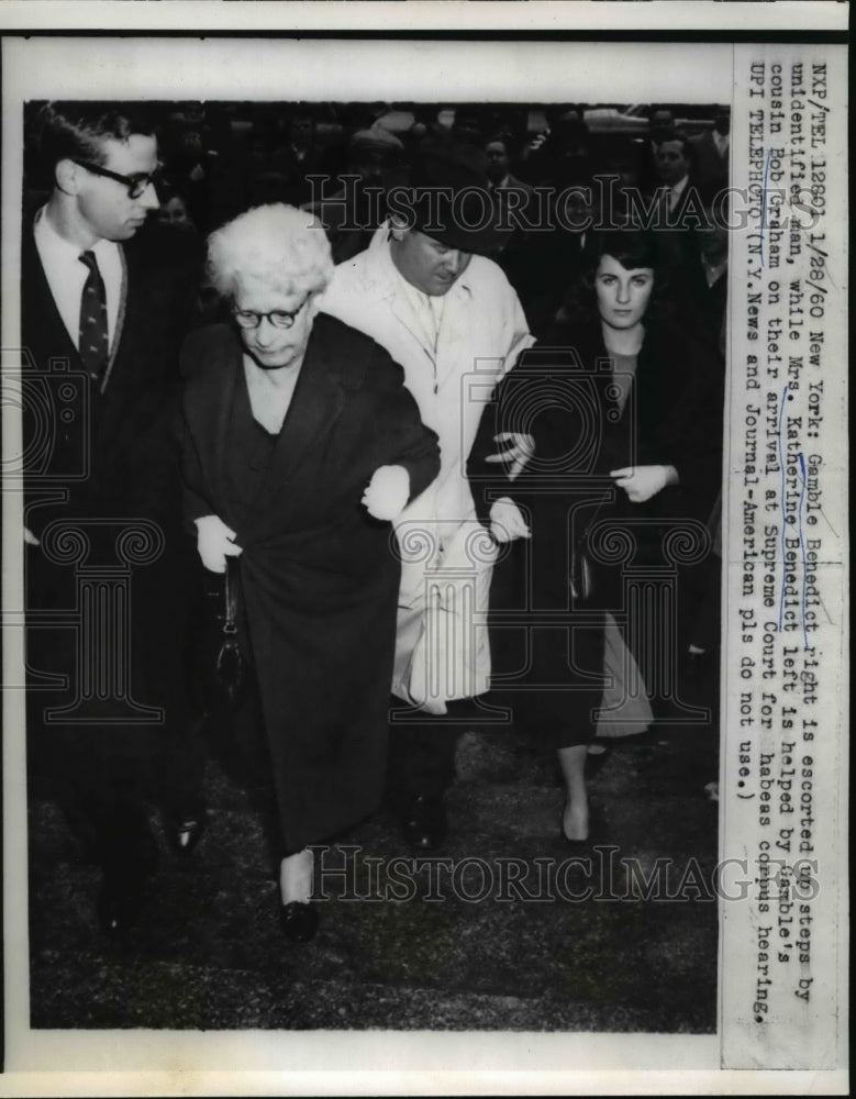 1960 Press Photo of Gamble Benedict(R) , Mrs Katherine Benedict (R) is helped - Historic Images