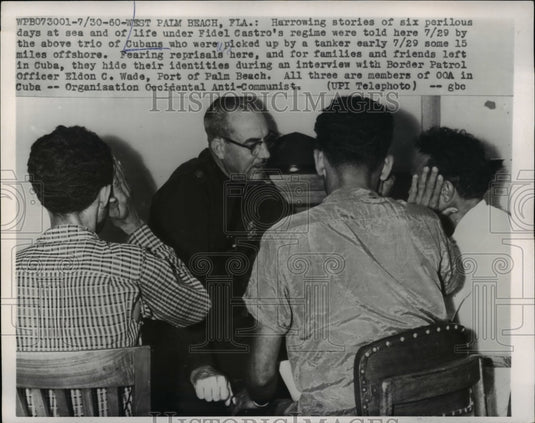 1960 Press Photo W Palm Beach Fla 3 Cubans  rescued from ocean & EC Wade - Historic Images