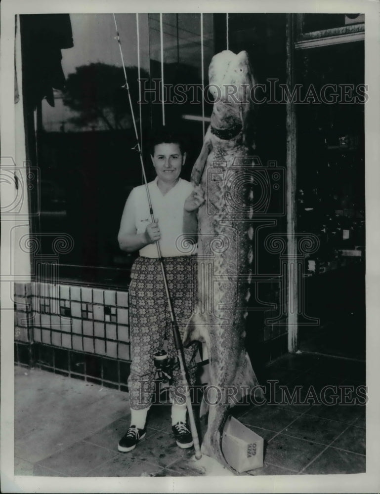 1961 Mrs. Paul Ankey with her 130-pound sturgeon-Historic Images