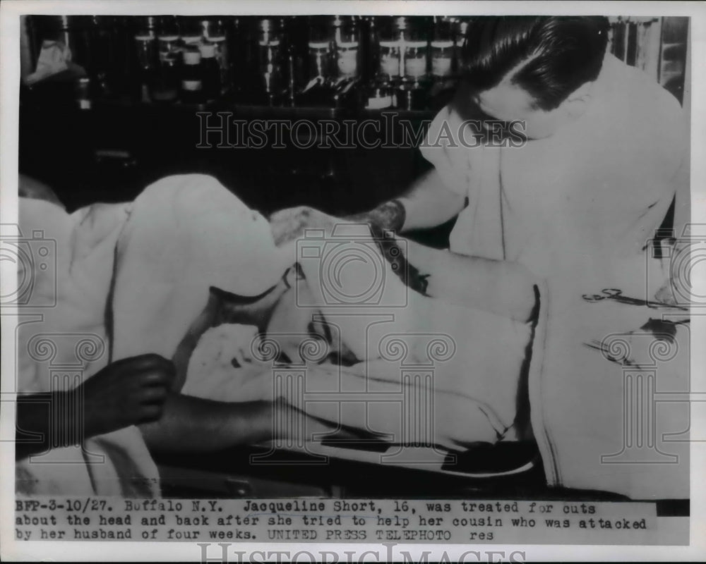 1955 Press Photo Jacqueline Short treated for cuts after helping cousin attacked - Historic Images