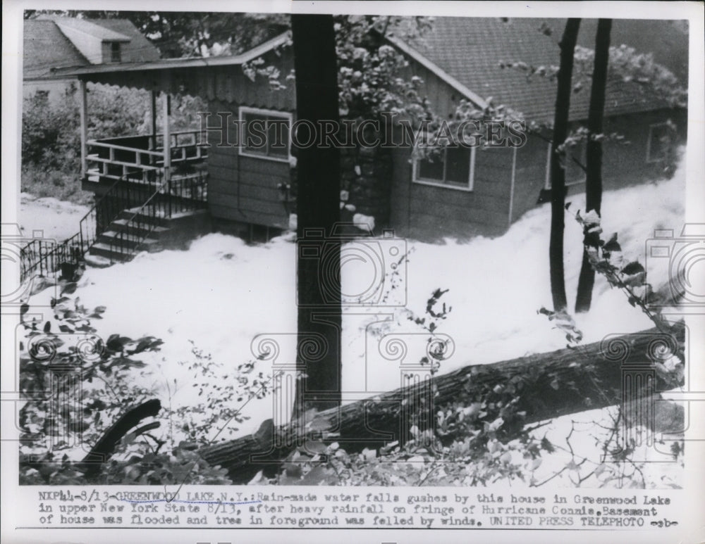 1955 Press Photo Water falls gushes by the house in Greenwood Lake - Historic Images