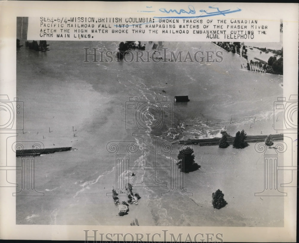 1948 Press Photo Broken tracks of Canadian Pacific Railroad fall in flood - Historic Images