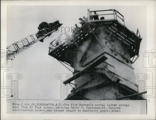 1948 Press Photo Fire Bureau's aerial ladder swing away from 50 foot tower - Historic Images