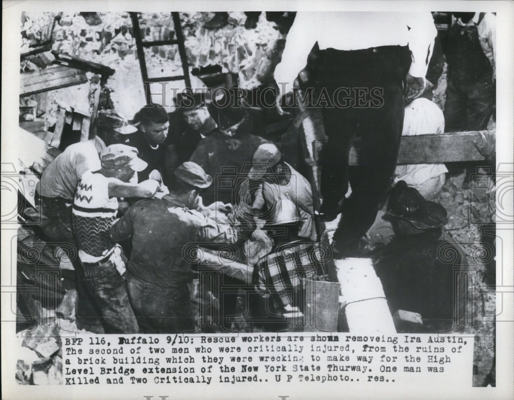 1953 Press Photo Ira Austin with Rescue Workers After Injured Wrecking Building - Historic Images