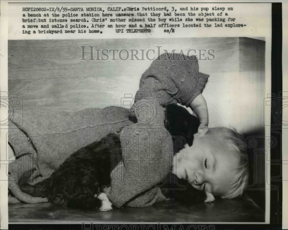 1959 Press Photo Santa Monica California Petticord Asleep With Puppy With Police - Historic Images