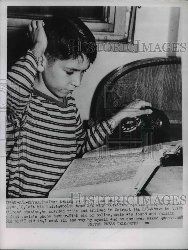 1953 Press Photo Phillip Finally Found his Uncle&#39;s Number - Historic Images