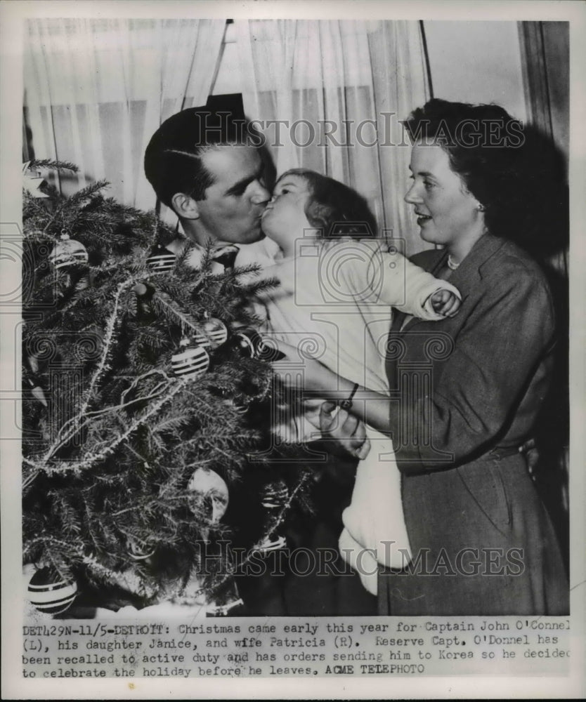 1951 Press Photo Christmas came early for Captain John O&#39;Donnel, his daughter - Historic Images
