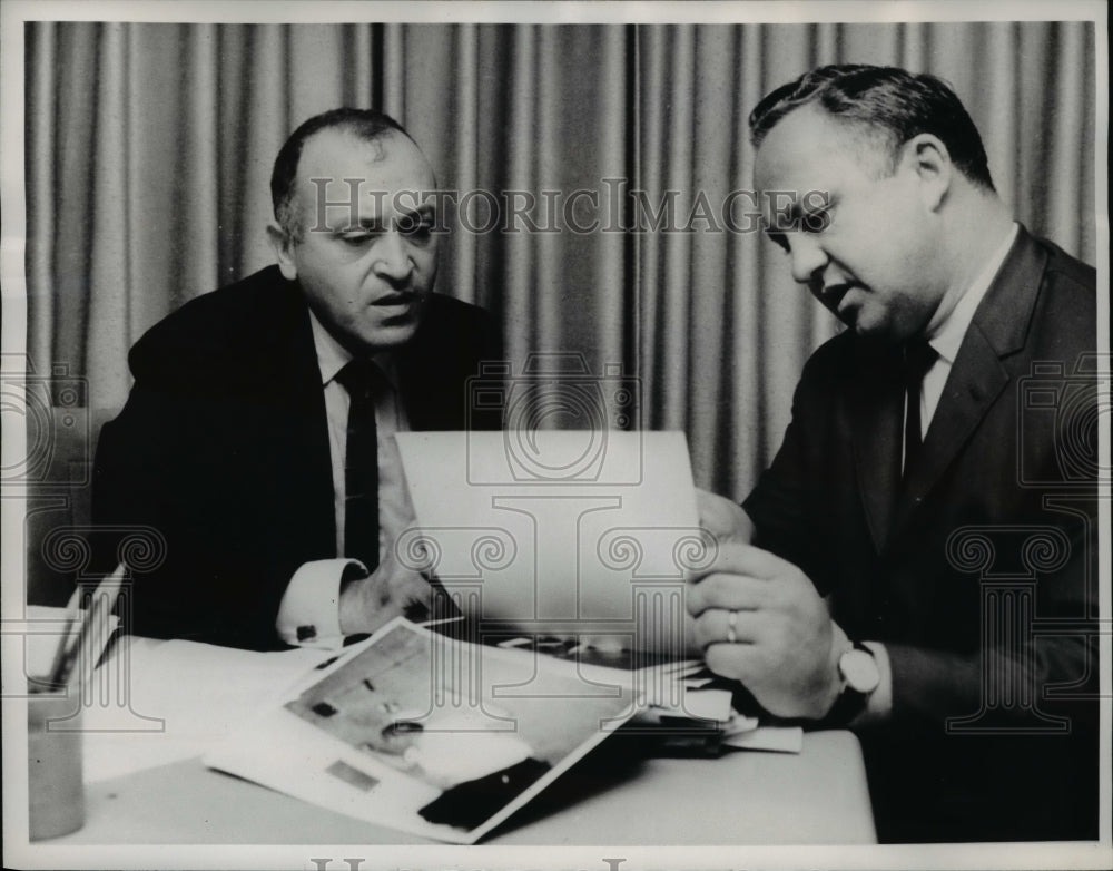 1963 Press Photo Producer Arthur Zegart and Inspector Bob Kane checks out photos - Historic Images