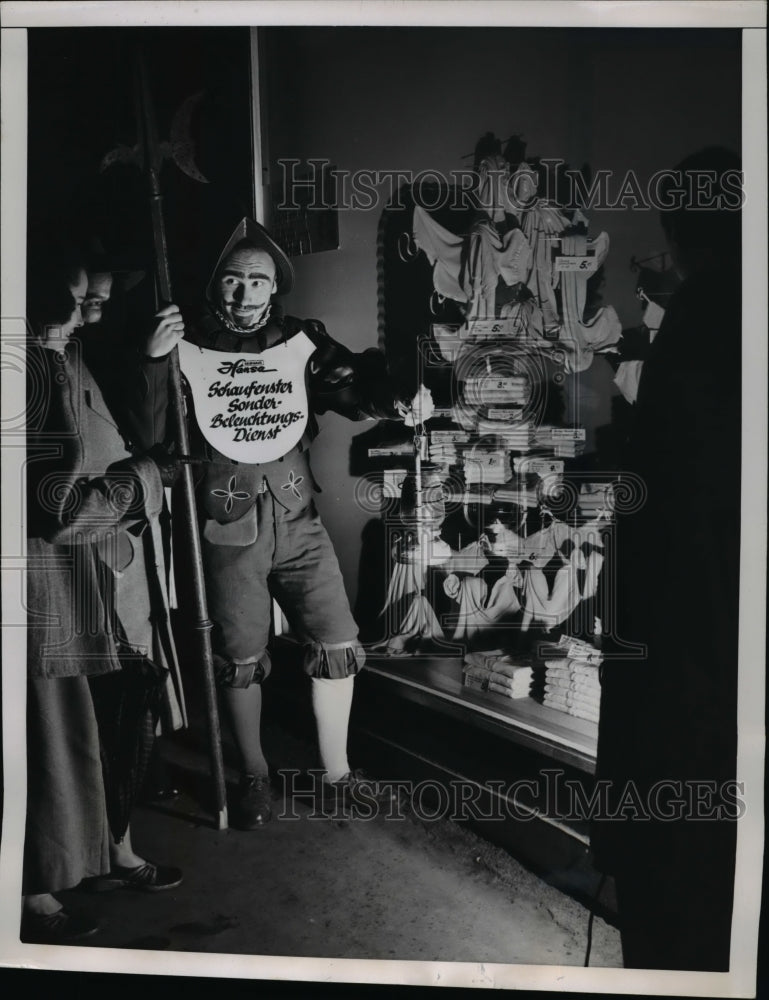 1951 Press Photo Warehouse Shop Window Guard with Lantern, Frankfurt Germany - Historic Images