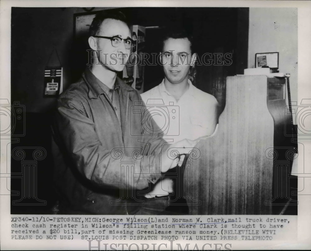 1953 Press Photo George Wilson &amp; Norman Clark on Wilson&#39;s cash register - Historic Images