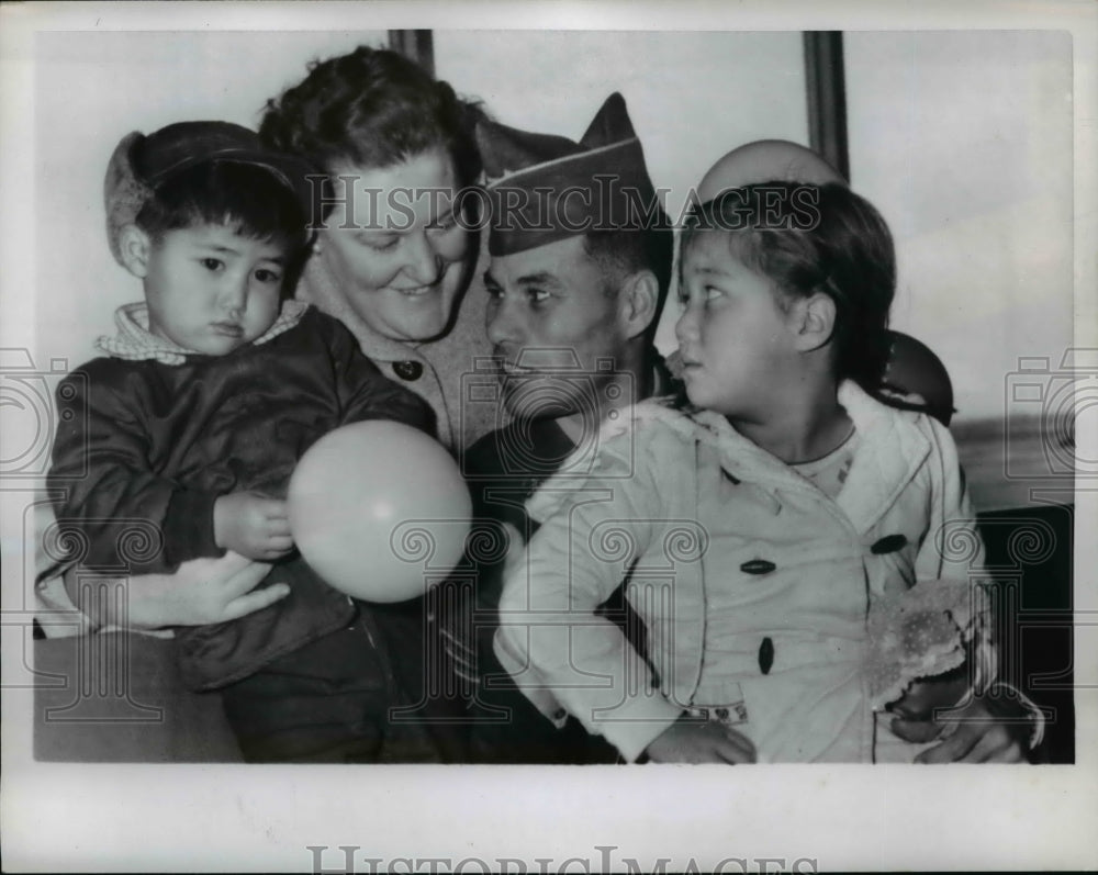 1957 Doris Simon Greets Husband Harry And Two Adopted Children - Historic Images