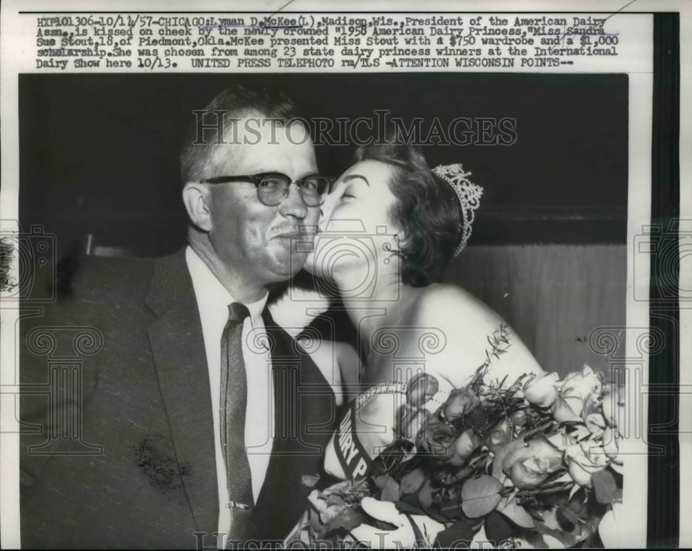 1957 Press Photo Lyman D. McKee Kissed by Dairy Princess Sandra Sue Stout - Historic Images