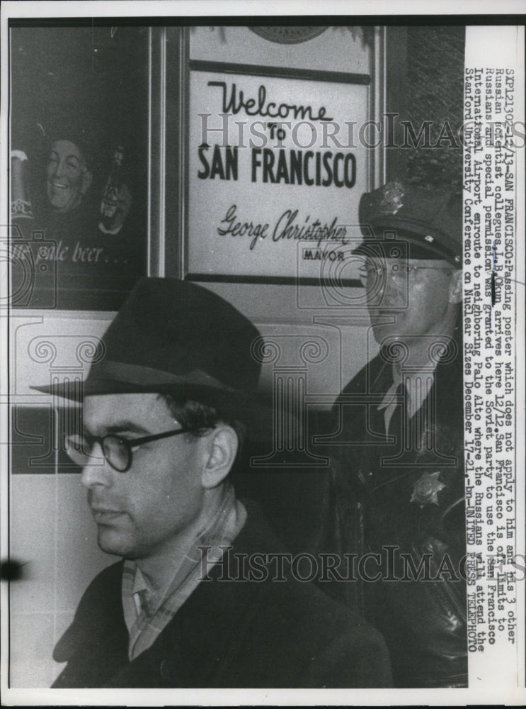 1957 Press Photo Russian Scientist L.B. Okun with Police Escort, San Francisco - Historic Images