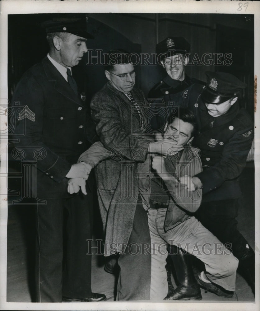 1945 Press Photo James Sweeney Gets violent due to not Wanting to be Searched - Historic Images