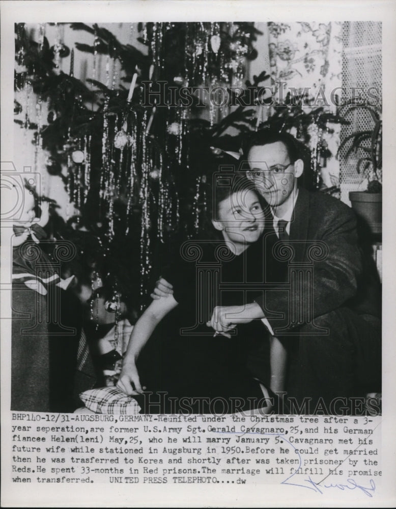 1954 Press Photo Gerald Cavagnaro reunited with fiance Helen after years apart - Historic Images