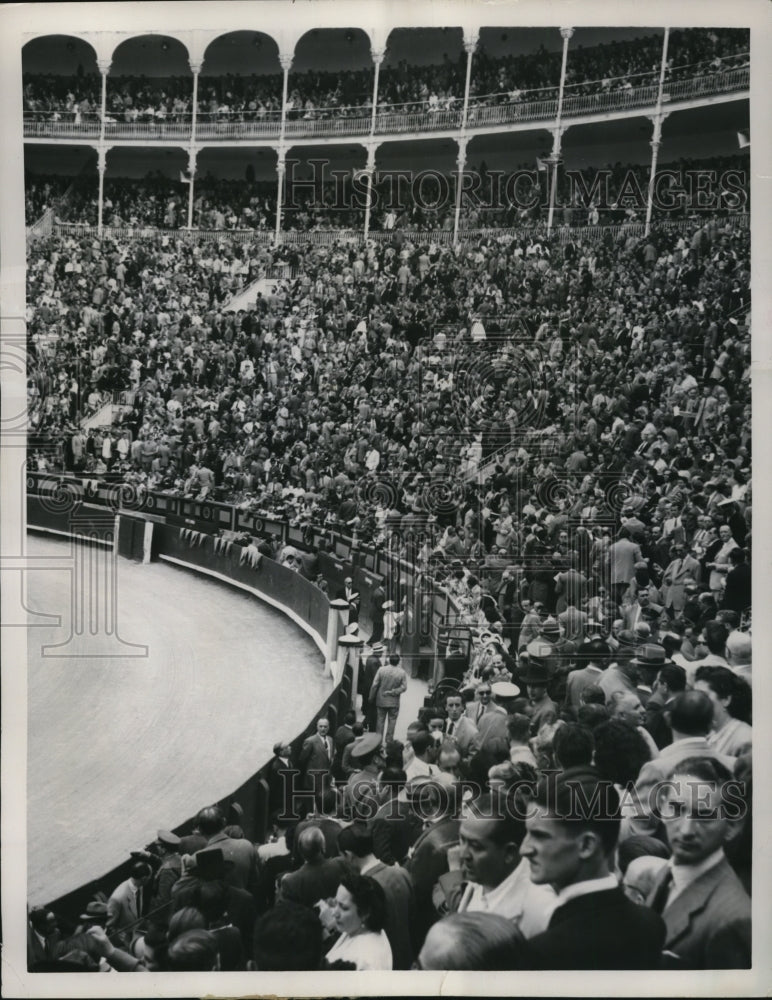 1949 Fans at the bull fight arena when the bull jumps over the fans-Historic Images