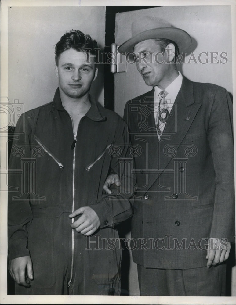 1953 Press Photo Urbana Ill US Airman Witold Glinski is shown with Deputy - Historic Images