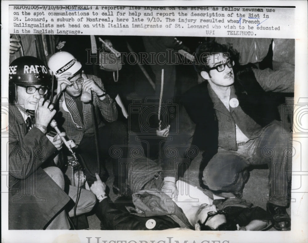 1969 Press Photo Newsman injured in the Riot in a suburb of Montreal. - Historic Images