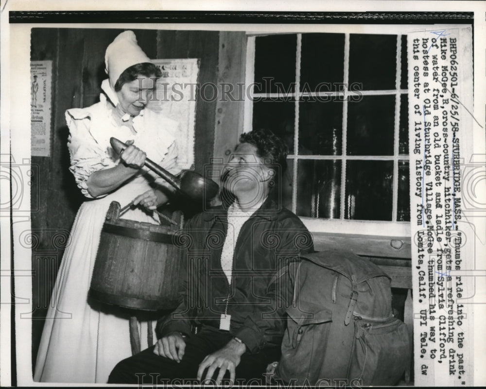 1958 Press Photo Mike McGee gets refreshing drink of water from Sylvia Clifford - Historic Images