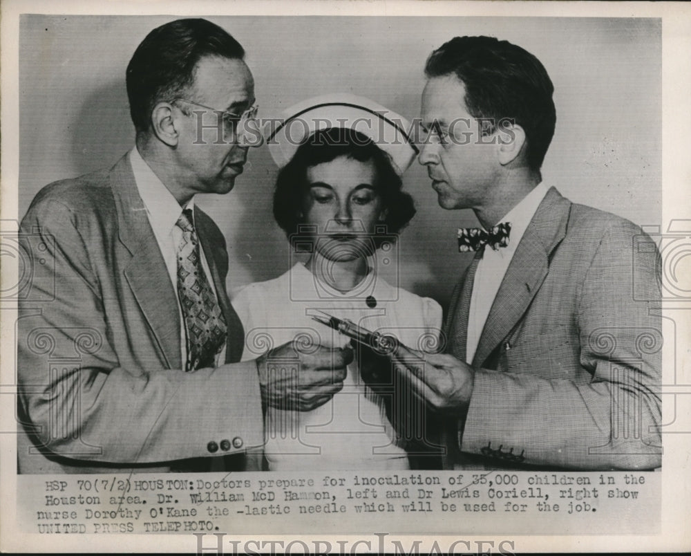 1952 Press Photo Dr. W. McD. Hammon &amp; Dr. Lewis Coriell show needle to nurse - Historic Images