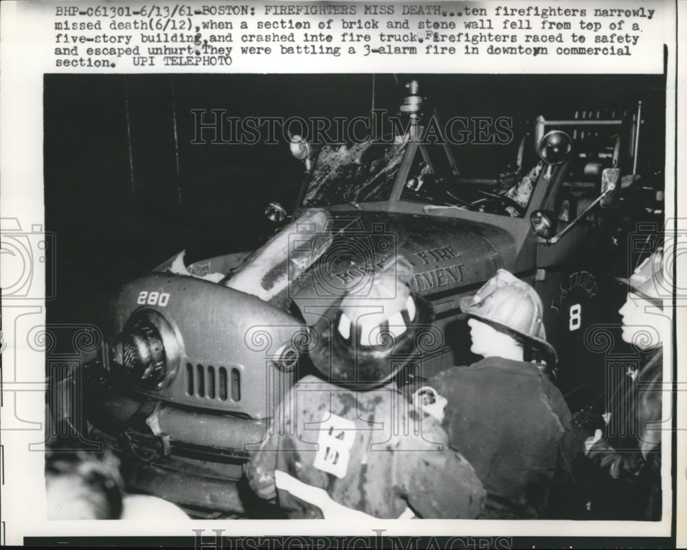 1961 The fire caused the building&#39;s wall to crashed into the truck-Historic Images