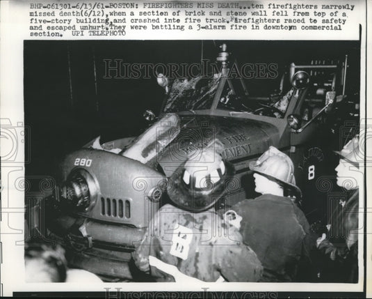 1961 The fire caused the building's wall to crashed into the truck-Historic Images