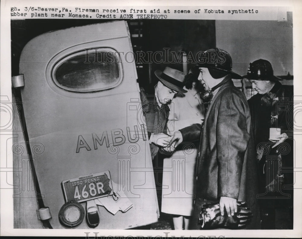 1951 Press Photo Fireman received first aid at the Kobuta Synthetic Rubber Plant - Historic Images