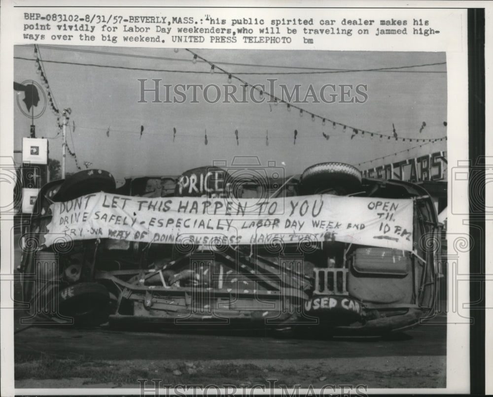 1957 Press Photo The tarpaulin of the car dealer during the Labor Day - Historic Images