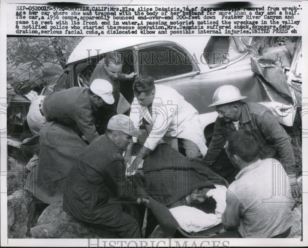 1957 Press Photo Mrs. Elsa Alice DeAmicis was removed from her car wreckage - Historic Images