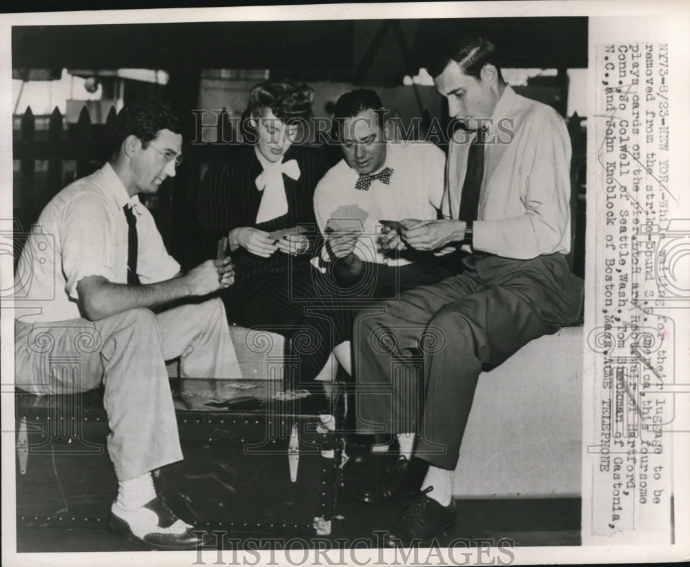 1947 Press Photo Foursome plays card while Strike bound S.S. America inNew York - Historic Images