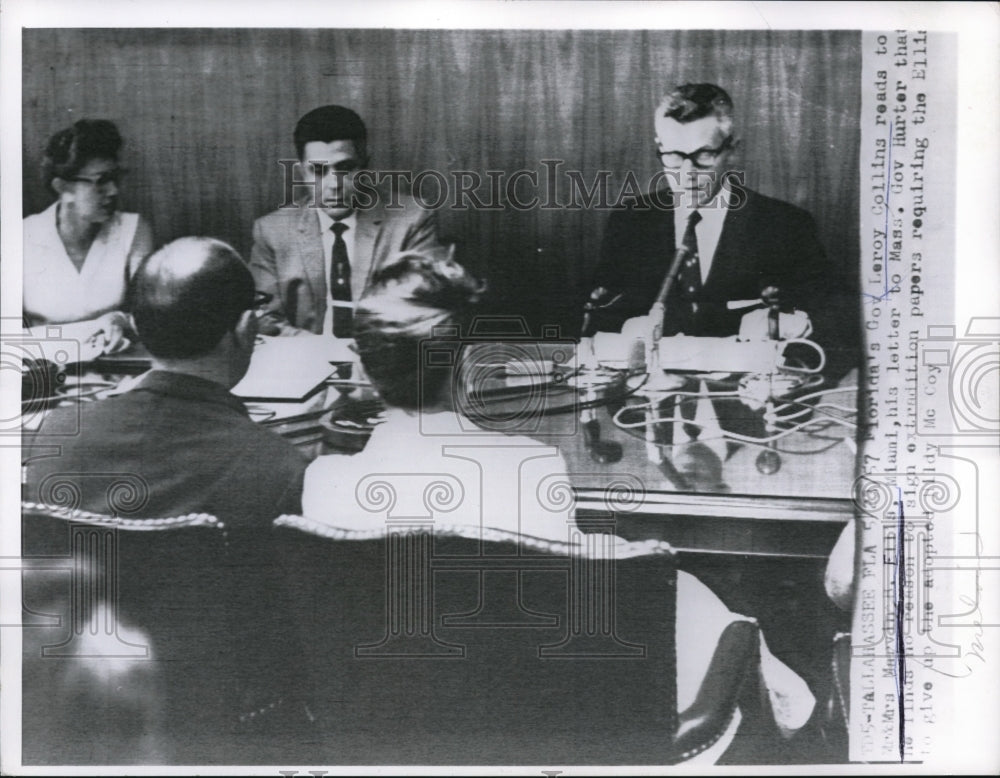 1957 Press Photo Florida&#39;s Governor L. Collins reads to M.B. Elbia - Historic Images