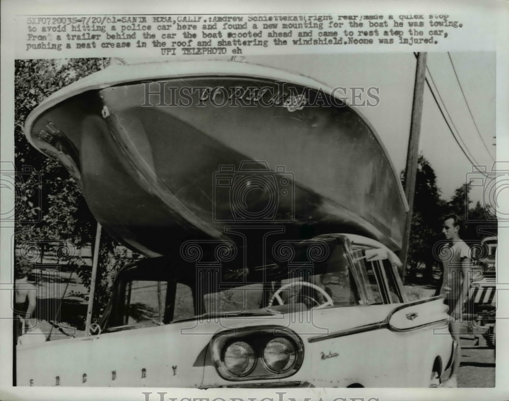 1961 Press Photo Boat Atop Car After Accident of Andrew Schiettekat, California - Historic Images