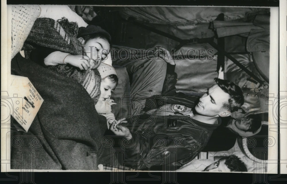 1960 Dave Averill Comforting Siblings on US Globemaster-Historic Images