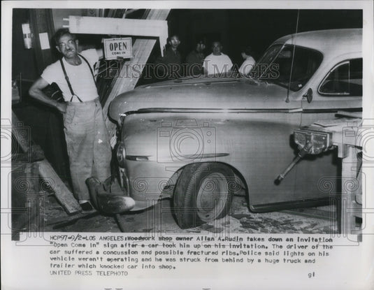 1954 Allan A. Rudin takes down an invitation "Open Come In" sign - Historic Images