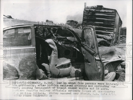 1956 Press Photo Bismark N Dak car in whicj 5 injured on railroad track - Historic Images