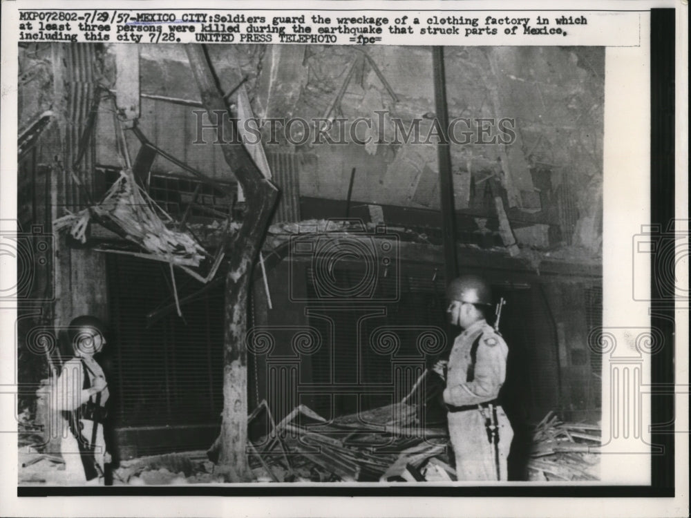 1957 Press Photo Mexico City guards at arear destroyed by earthquake - nee04404-Historic Images