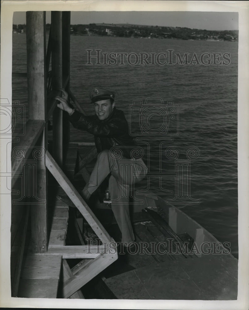 1942 Lt. Col. T.D. Tway, an executive officer, seen boarding a boat - Historic Images