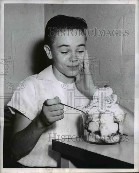 1956 Press Photo Dale Reynolds looks afraid of his king sized sundae - nee15173-Historic Images