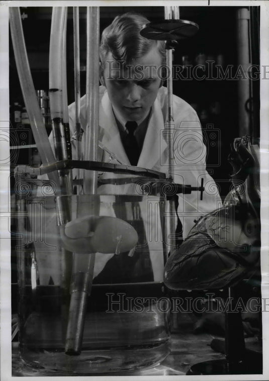 1969 Jim Wright tests pump capacity at Goodyear labs  - Historic Images
