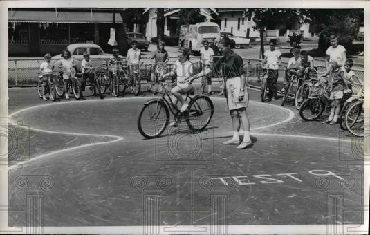 1960 The children and Miss Ruth Yanka at the bike Brigside - Historic Images