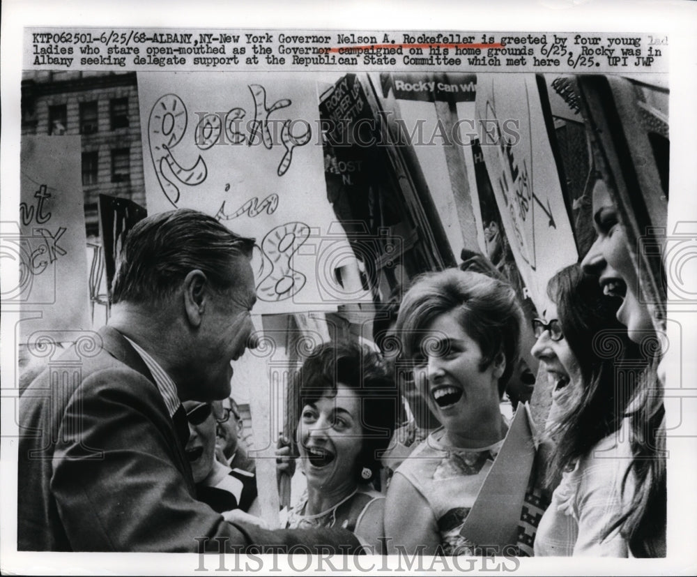 1968 Press Photo Governor Nelson A. Rockefeller Greeted by Four Ladies in Albany-Historic Images