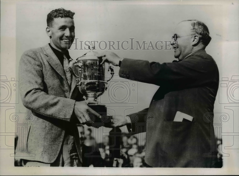 1938 Alex Henshae receives the King Cup from Sir Kingsley Wood. - Historic Images